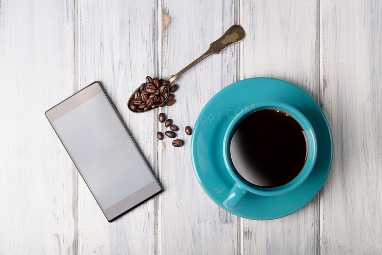 手机咖啡豆与一杯咖啡摄影高清图片