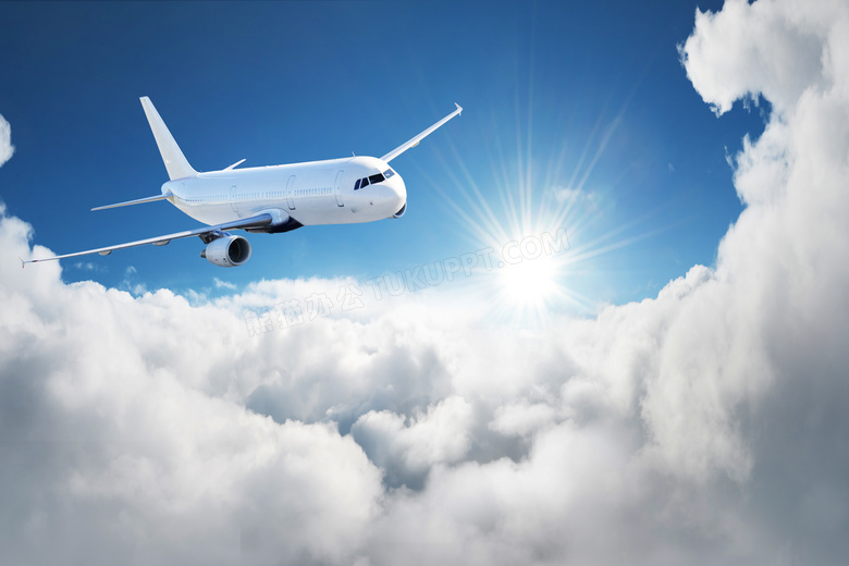 飞行在云层之上的飞机摄影高清图片