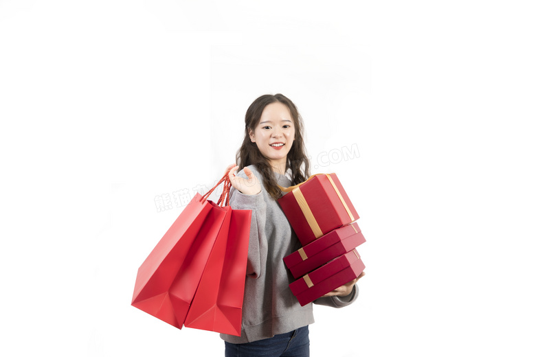 春节手拿礼物盒购物袋的女性