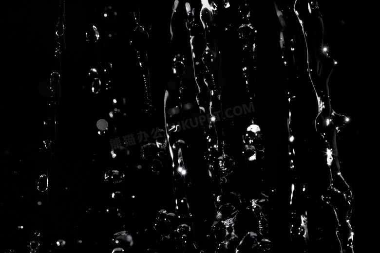 泼水水流黑色背景图片