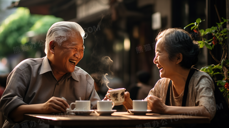 一起喝茶的老人夫妻摄影图