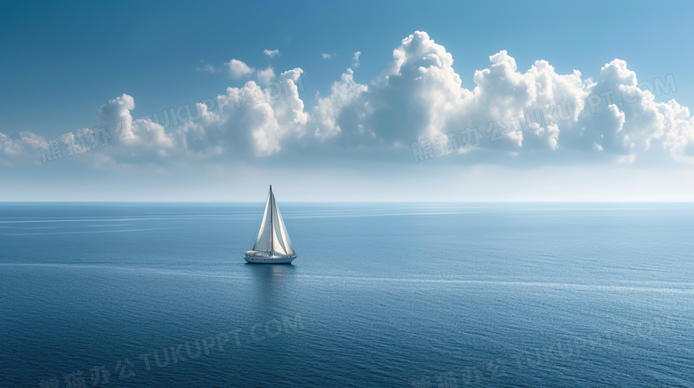 一艘帆船在蓝色的大海上航行图片