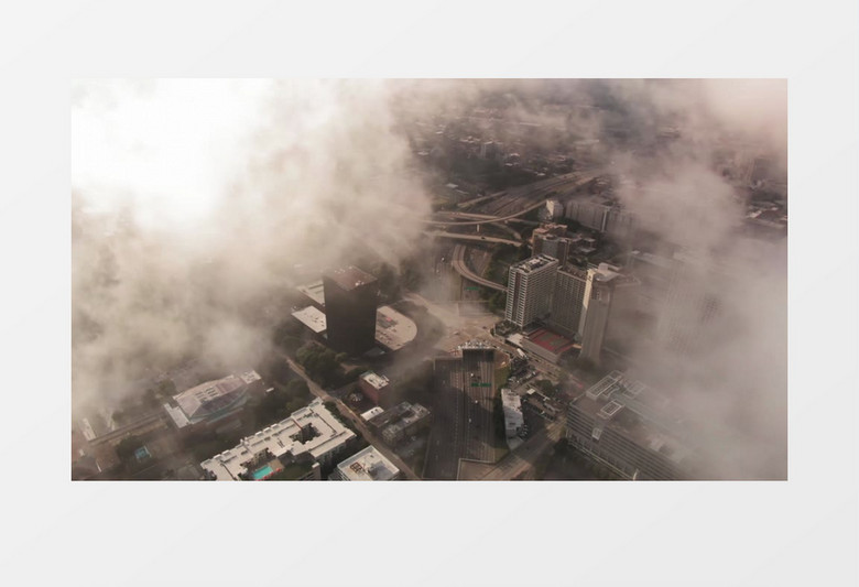 航拍云层下的城市建筑实拍视频素材实拍视频素材