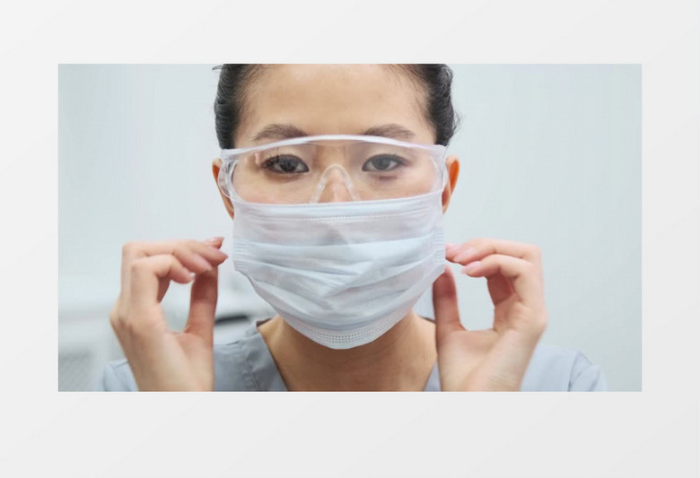 美女医生在摘掉口罩实拍视频素材
