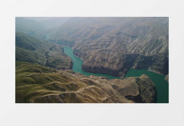 实拍层峦叠嶂的山川和山脚下的小河实拍视频素材