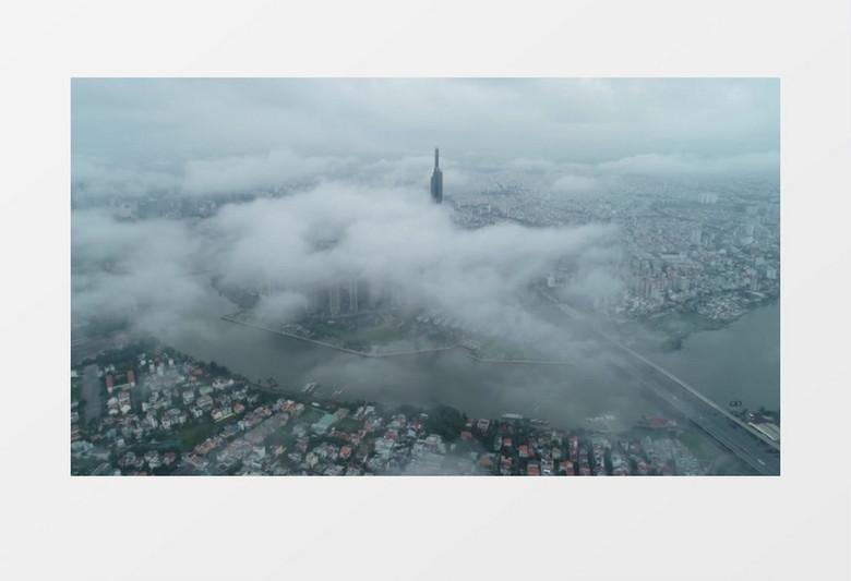 俯拍城市上空氤氲的云朵和朦胧的城市景象实拍视频素材