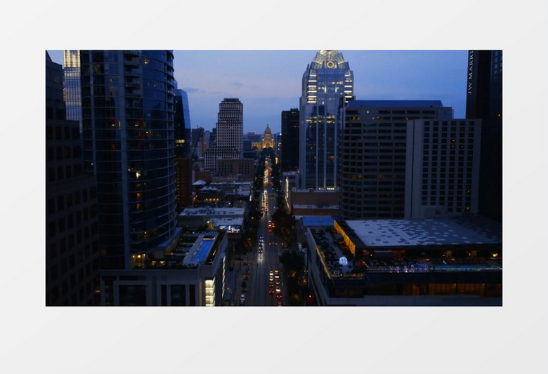 实拍清晨闪烁着灯光的城市建筑实拍视频素材