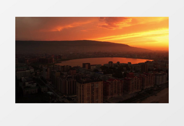 航拍夕阳下的城市景观实拍视频素材