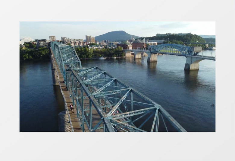 横跨河流的桥梁和周边小镇景观实拍视频素材