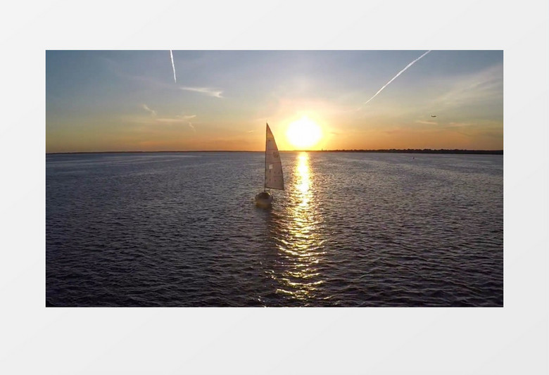 落日下海面的帆船与海面实拍视频