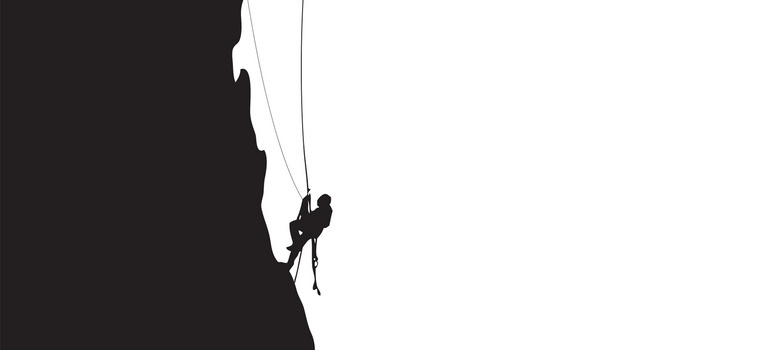 黑白剪影登山的人