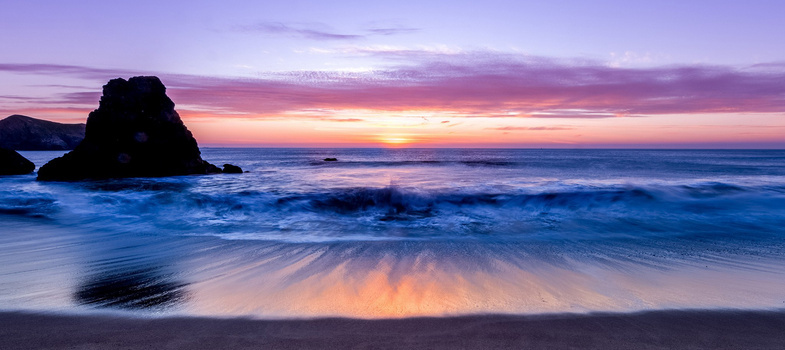 夕阳与海的照片图片