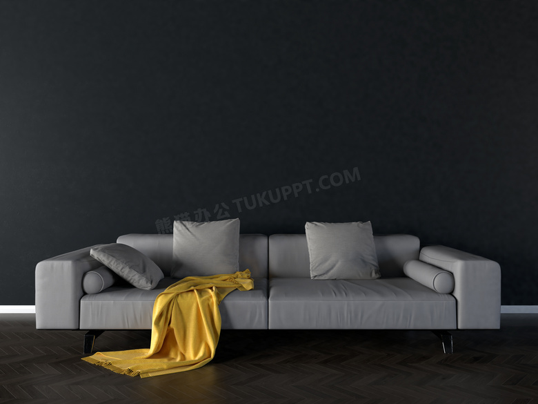 黑色墙壁前的灰色沙发摄影高清图片