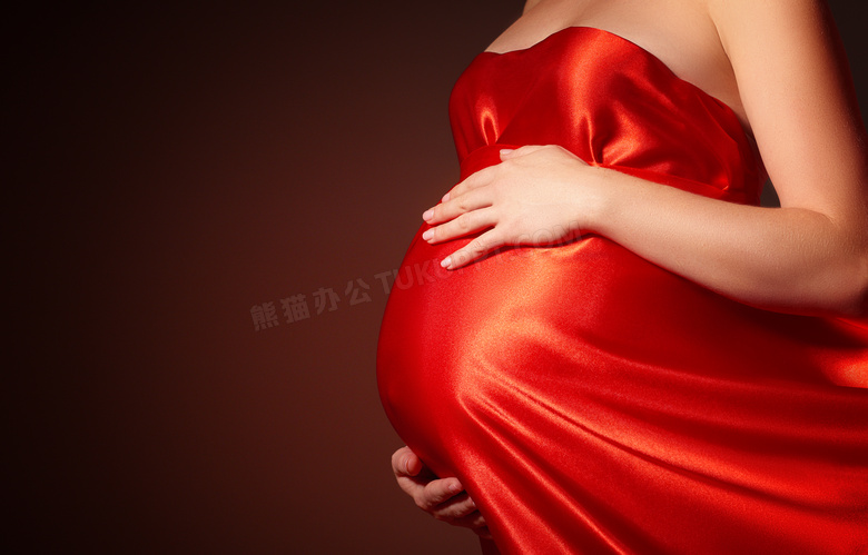 红裙装扮孕妇人物局部特写摄影图片