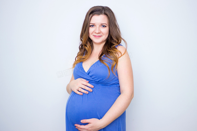 蓝色装扮开心孕妇人物摄影高清图片