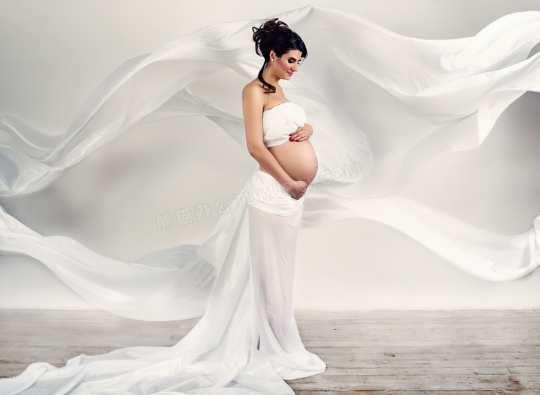 飘逸白纱前的孕妇人物摄影高清图片