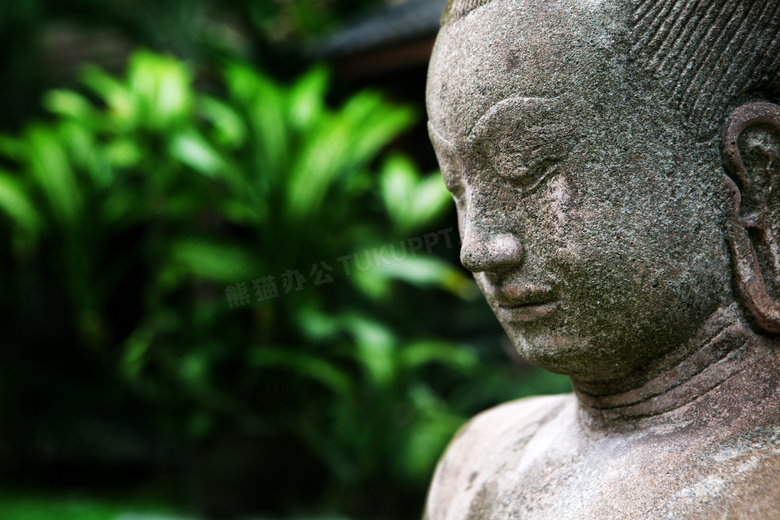 沉思状的佛教石像特写摄影高清图片