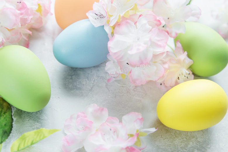 复活节彩蛋与粉色花朵特写高清图片