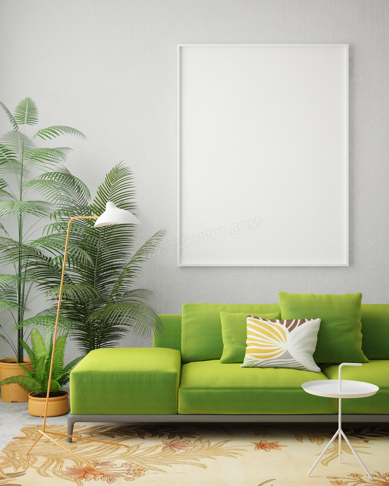 房间绿色沙发与空白装饰画高清图片