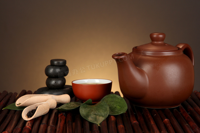 茶碗热石与紫砂壶特写摄影高清图片