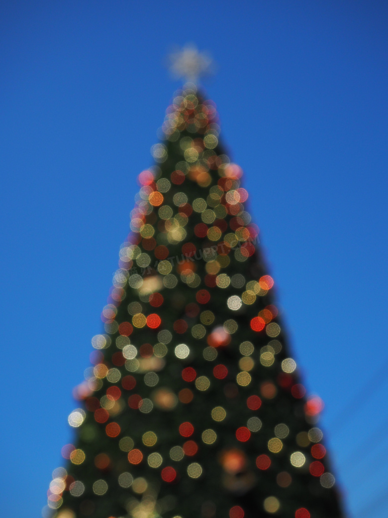 梦幻散景光斑效果的圣诞树高清图片