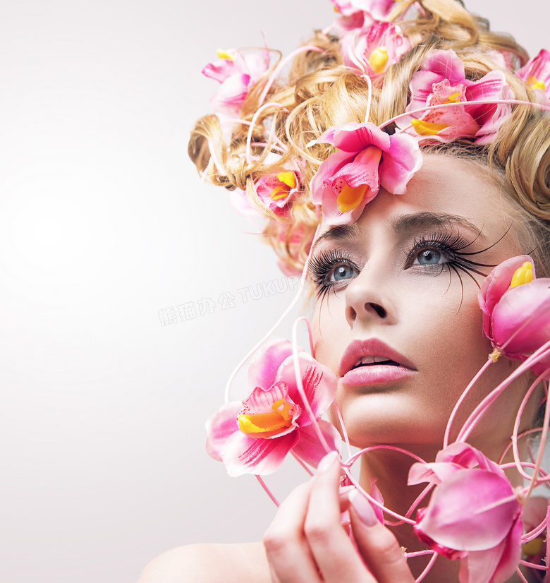 花朵装饰的长睫毛美女摄影高清图片