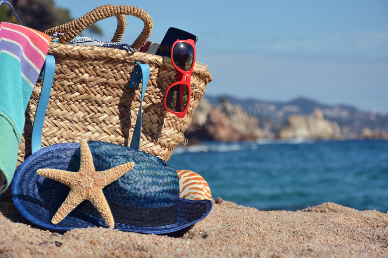 沙滩上的海星遮阳帽等摄影高清图片