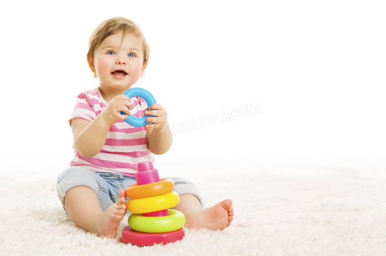 玩着玩具的条纹衫宝宝摄影高清图片