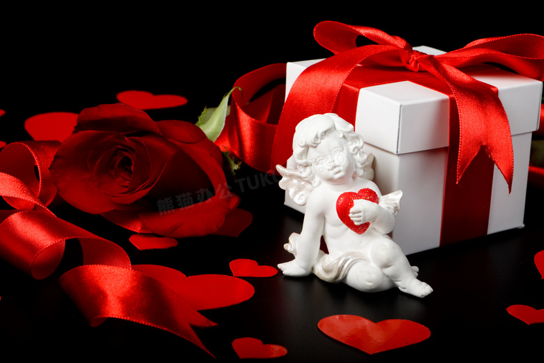 红玫瑰花朵与礼物盒等摄影高清图片