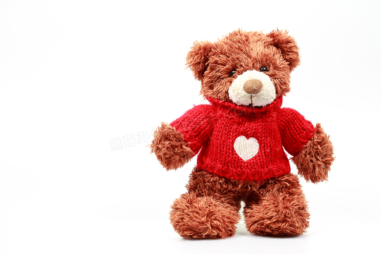 身穿针织毛衣的玩具熊摄影高清图片