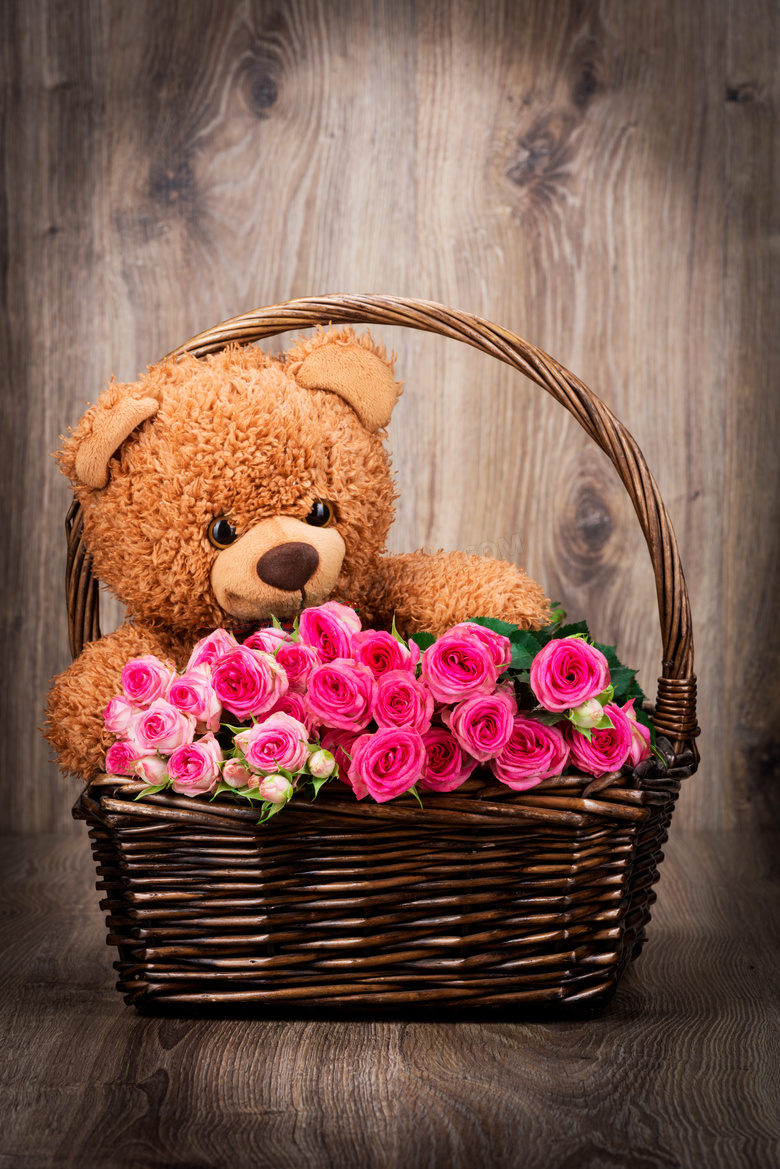 泰迪熊与装满玫瑰花的花篮高清图片