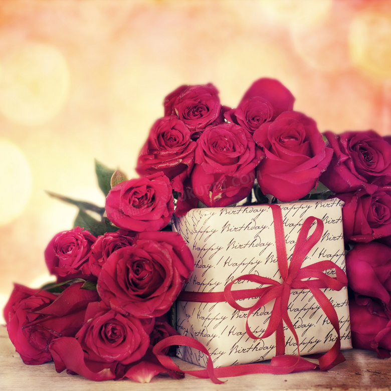 礼物盒与红色玫瑰花朵摄影高清图片
