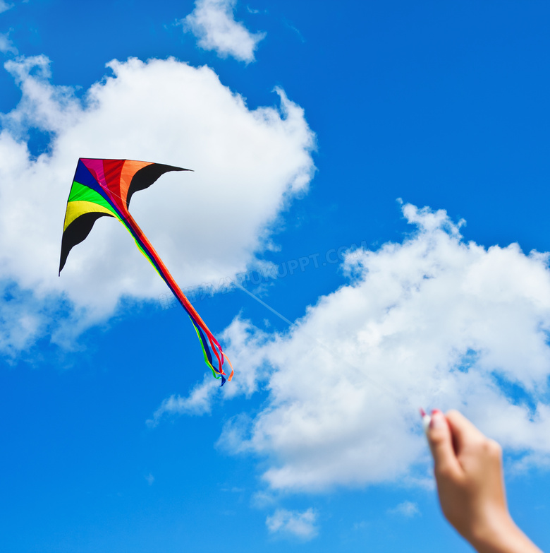 蓝天白云与放飞的风筝摄影高清图片