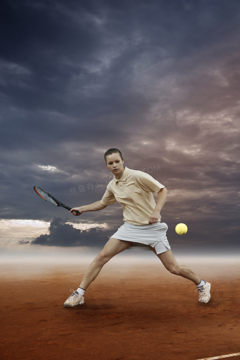 挥拍击球的网球运动员摄影高清图片
