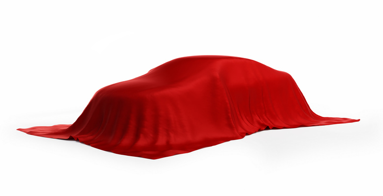 蒙上一层红色布的汽车摄影高清图片
