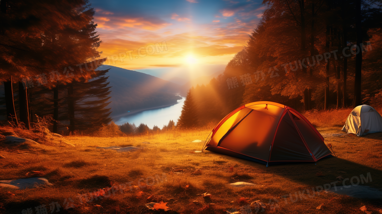 秋季夕阳时分在山坡草地上搭帐篷露营美景摄影图