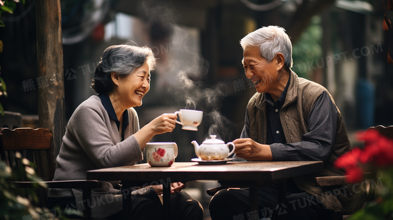 一起喝茶的老人夫妻摄影图