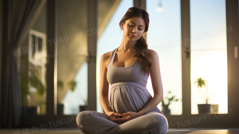 孕妇在做瑜伽摄影图
