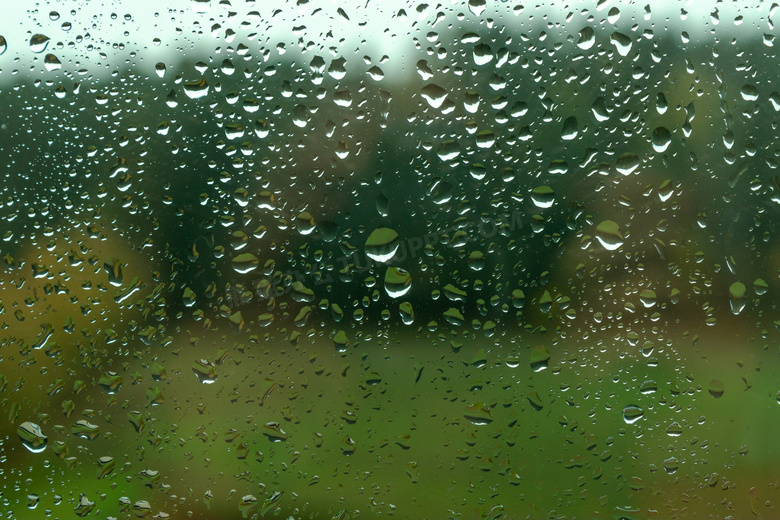 玻璃窗雨滴背景图片