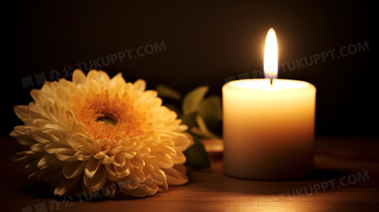 点燃的白色蜡烛和菊花图片