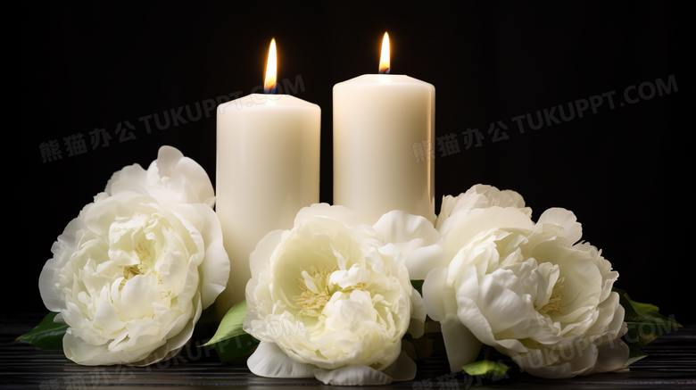 鲜花和点燃的蜡烛图片