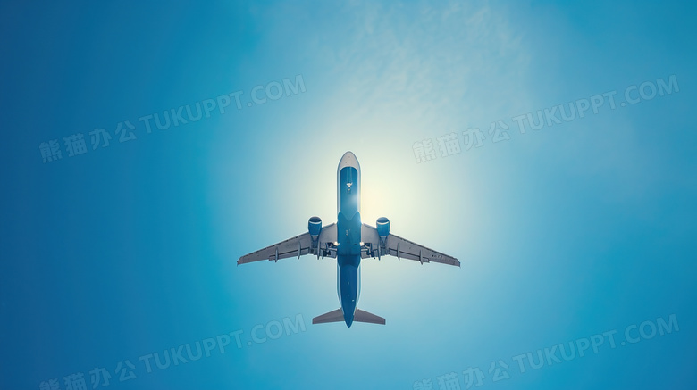 蓝色天空中翱翔的飞机图片