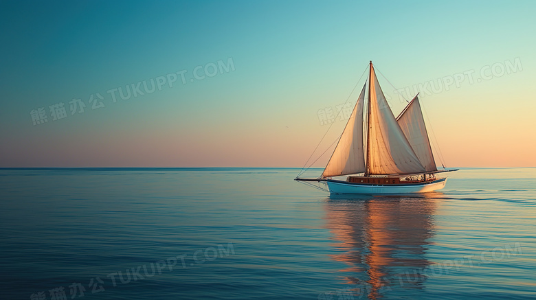 黄昏时刻在海上航行的帆船图片