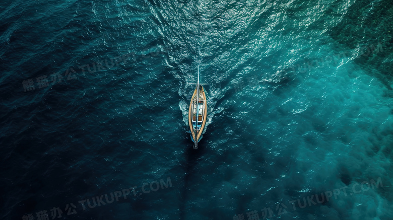 蓝色海洋上航行的游艇俯视图图片