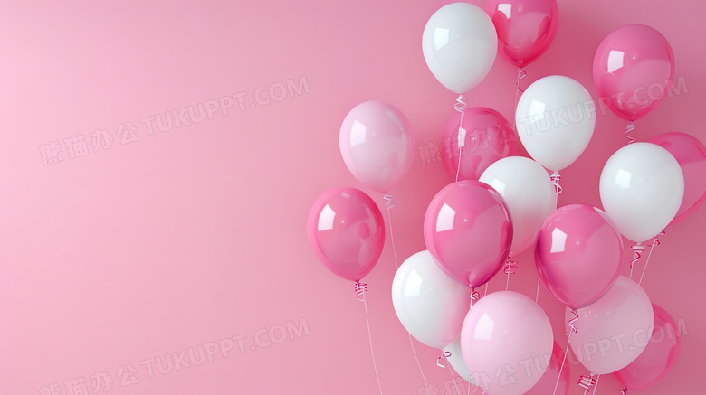 粉红背景前的一束气球图片
