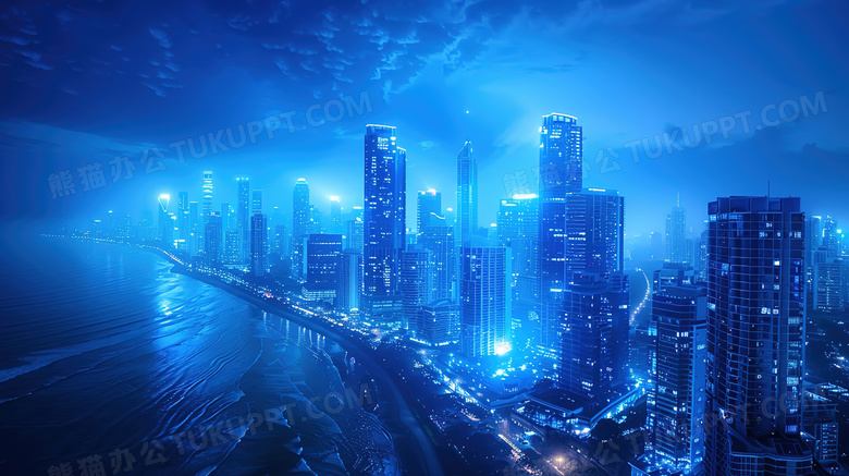 蓝色城市建筑海边夜景图片