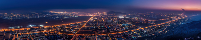 天空下的城市夜景建筑摄影图片