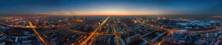 天空下的城市夜景建筑摄影图片