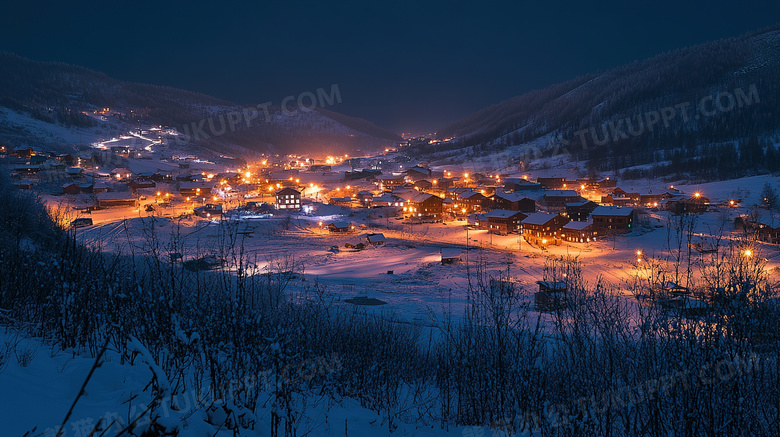 冬天村庄灯火夜景雪景图片