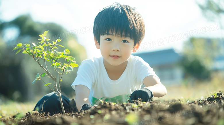 男孩植树节保护环境栽树种树图片